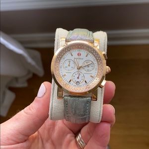 Michele watch.  Round face in rose gold w/ diamond